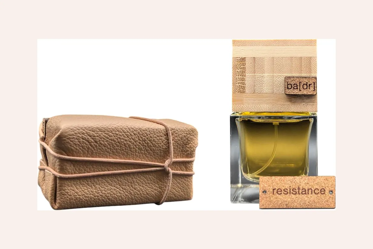 Frasco del perfume Résistance de ba[dr] junto a su estuche de cuero reciclado