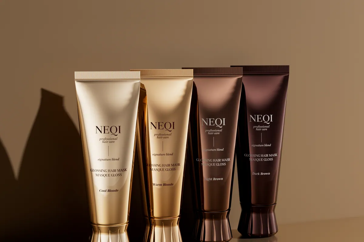 Las cuatro mascarillas Glossing de NEQI alineadas sobre fondo beige